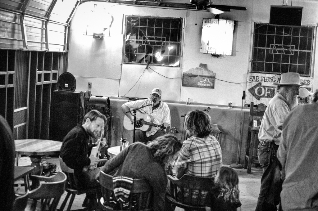 Jeffro Greasewood hosts the open mic at the Boathouse in Terlingua