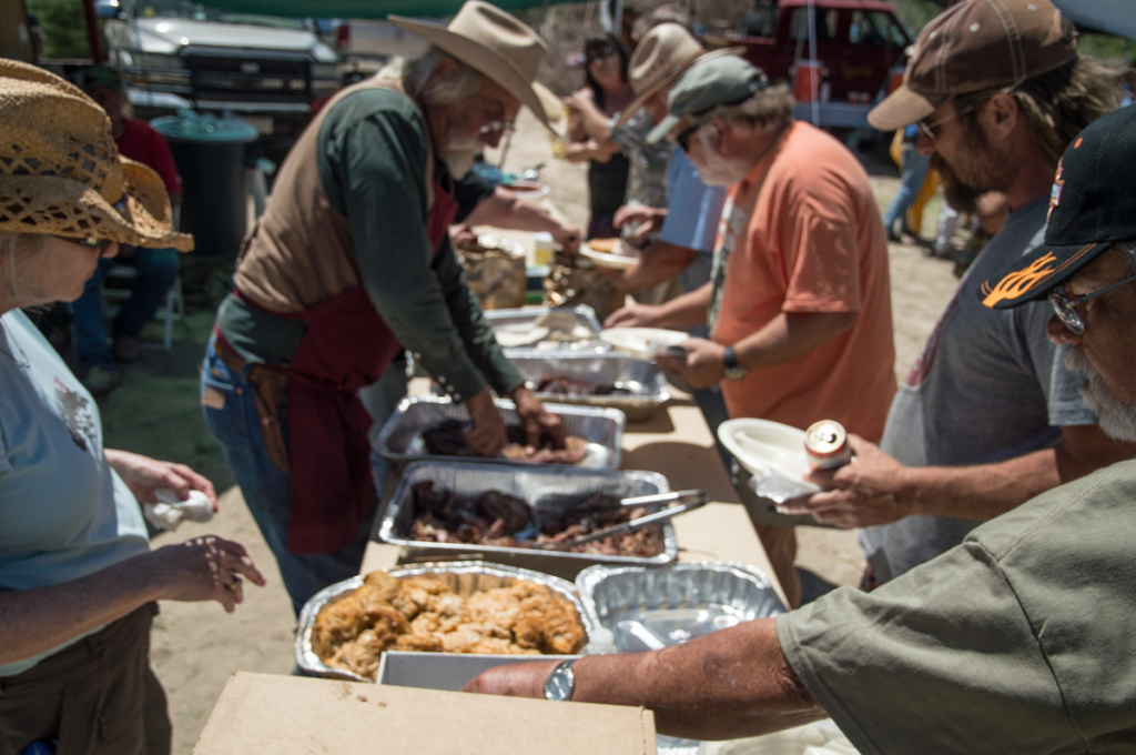 Luke Dudley serves BBQ