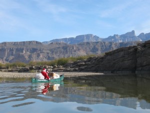 Santa paddling his sleigh to Boquillas