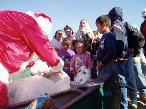 Santa delivers toys to the children of Boquillas