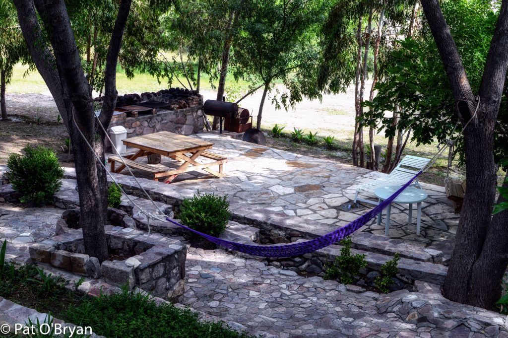 Grill, hammock, picnic table, shade, water...